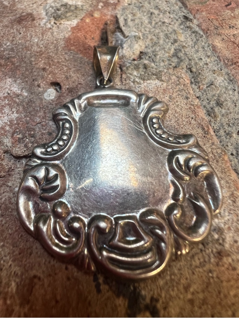 Vintage Sterling Silver medallion repousse pendant Stamped 925